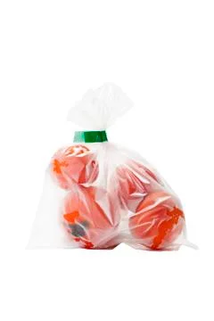 Tomatoes with plastic Stock Photos