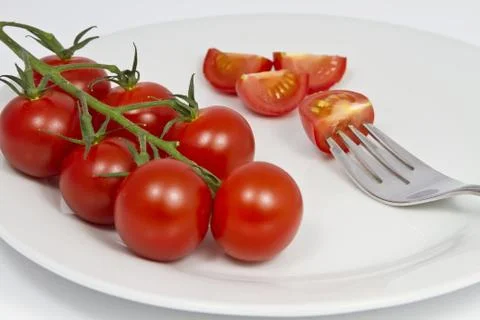 Tomatoes on a Plate Stock Photos