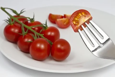 Tomatoes on a Plate Stock Photos