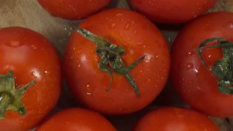 Tomatoes rotate as background Stock Footage 136427948