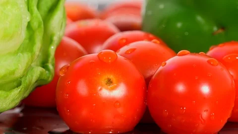 Tomatoes with salad vegetables 4K Video stock 91297487