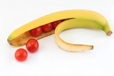 The tomatoes in the shell banana Stock Photos