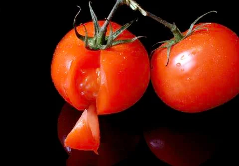 Tomatoes with slice Stock Photos