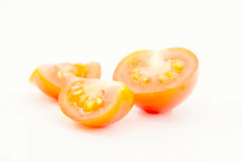 Tomatoes sliced in three pieces Stock Photos