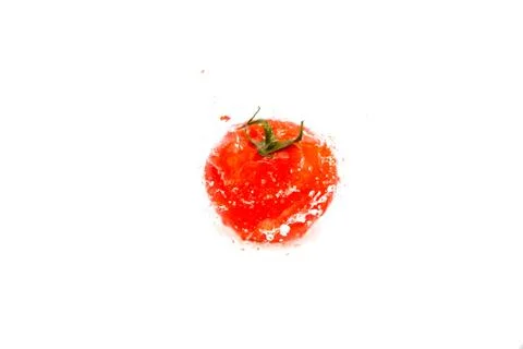 Tomatoes with splashes of water isolated on white Stock Photos