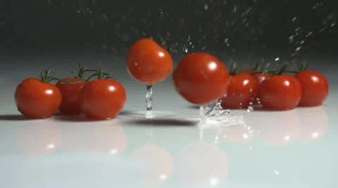 Tomatoes tomato splash slow motion Video stock 24738398