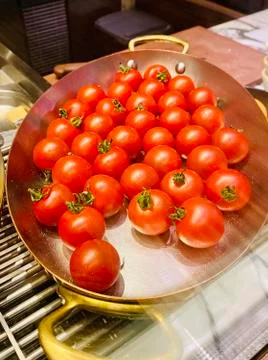 Tomatoes on a tray Stock Photos