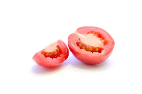 Tomatoes two sizes sliced ingredient Stock Photos
