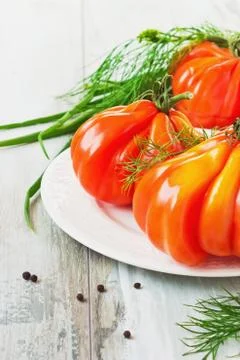 Tomatoes unusual shape Stock Photos