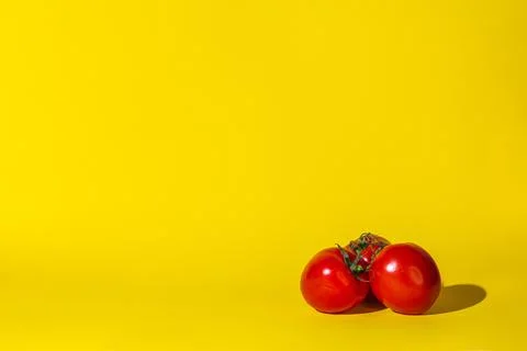 Tomatoes vegetables three objects Foto stock