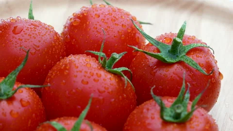 Tomatoes with water drops Stock Footage 150385449
