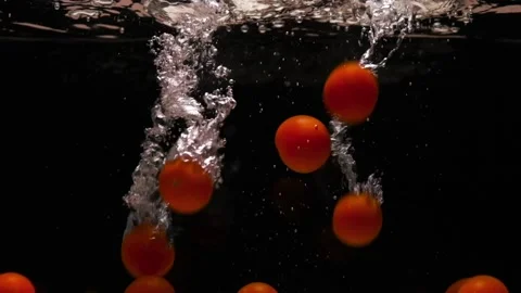 Tomatoes in water. Stock Footage 168921553