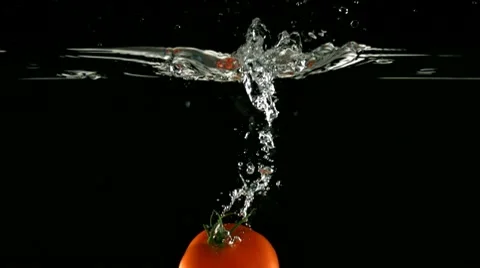 Tomatoes in water, Slow Motion Stock Footage 9302047