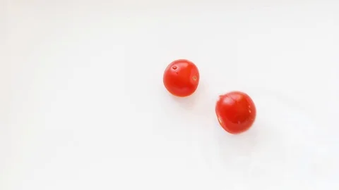 Tomatoes with water. Top view Stock Footage 127083012