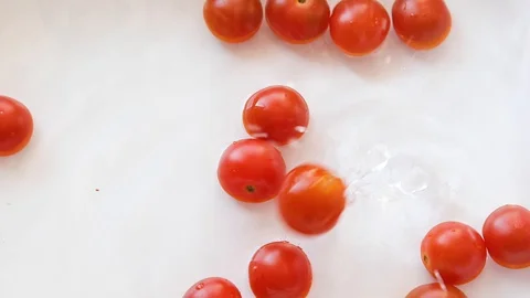 Tomatoes with water. Top view Stock Footage 128096788