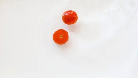 Tomatoes with water. Top view Stock Footage 128096831