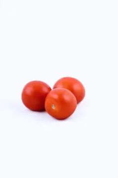 Tomatoes on white background Stock Photos