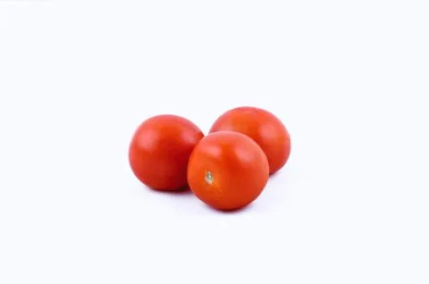 Tomatoes on white background Stock Photos