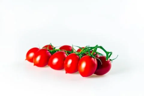 Tomatoes on a white background Stock Photos