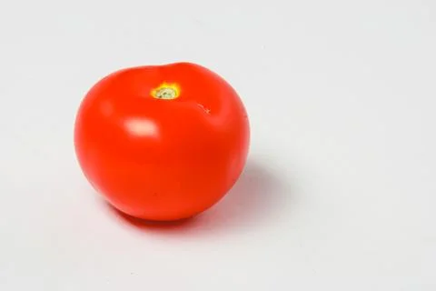 Tomatoes on a white background Stock Photos