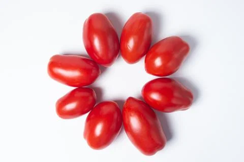 Tomatoes on a white background.  Stock Photos