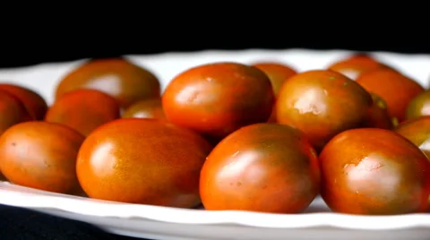 Tomatoes On A White Plate Stock Footage 65446788