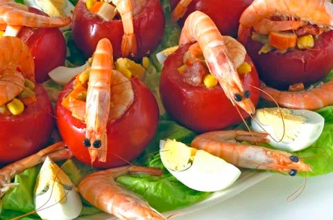 Tomatos with prawns Stock Photos