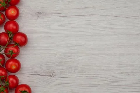 Tomatos on the white table Stockfoto's