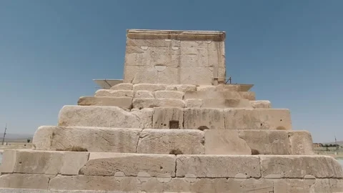 Tomb of Cyrus at Pasargadae, stepped limestone under clear desert sky Stock Footage 320273664