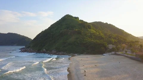 Tombo, Waves upon the rocks on tropical beach Stock Footage 127234271