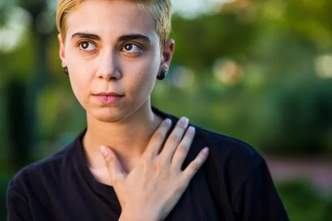 Tomboy androgynous lesbian non binary beauty in casual clothes gender lgtbi sex Stock Photos