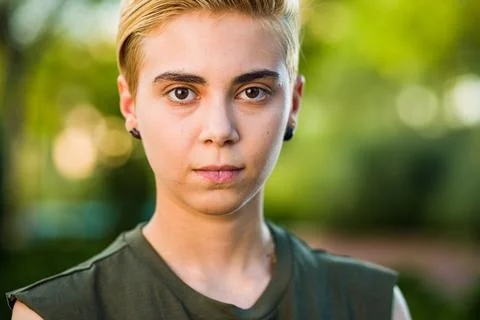 Tomboy androgynous lesbian non binary beauty in casual clothes gender lgtbi sex Stock Photos