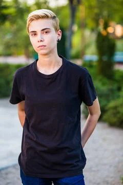 Tomboy androgynous lesbian non binary beauty in casual clothes gender lgtbi sex Stock Photos