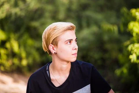 Tomboy androgynous lesbian non binary beauty in casual clothes gender lgtbi sex Stock Photos