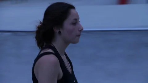 Tomboy takes a break from skating Stock Footage 109112253