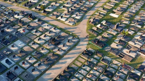 Tombs in a large cemetery with walkways between sections - aerial view Stock Footage 130014974