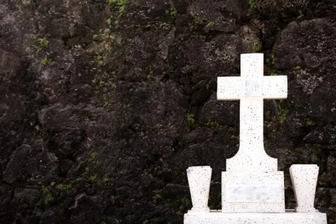 Tombstone and Wall 스톡 사진