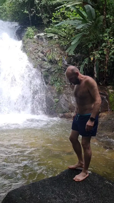 Ton Chong Fa Waterfall is a five-tiered waterfall located in Khao Lak Stock Footage 318813991