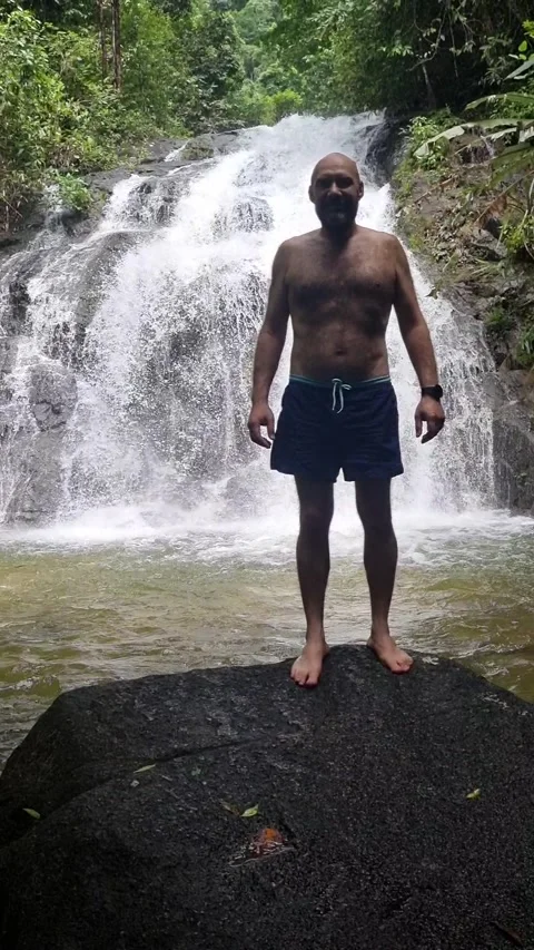 Ton Chong Fa Waterfall is a five-tiered waterfall located in Khao Lak Stock Footage 318813994