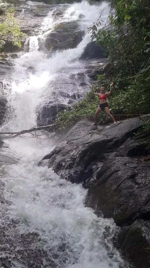 Ton Chong Fa Waterfall is a five-tiered waterfall located in Khao Lak Stock Footage 318814021