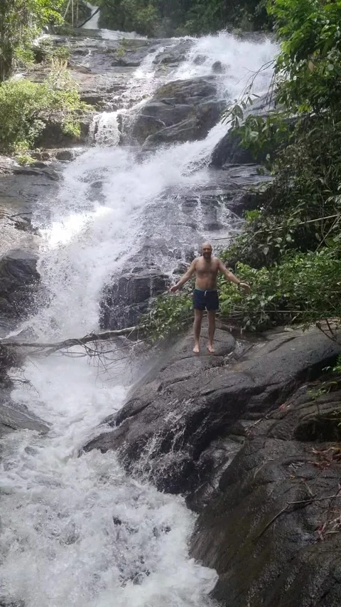 Ton Chong Fa Waterfall is a five-tiered waterfall located in Khao Lak Stock Footage 318814023