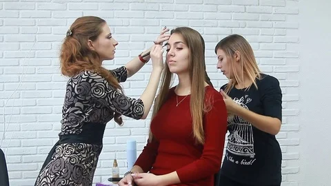 Tonal foundation makeup applied on the face of a supermodel Video stock 81573915