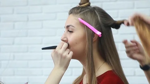 Tonal foundation makeup applied on the face of a supermodel Stock Footage 81573956