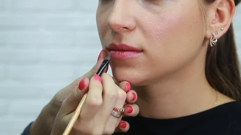 Tonal foundation makeup applied on the face of a supermodel Stock Footage 81908650