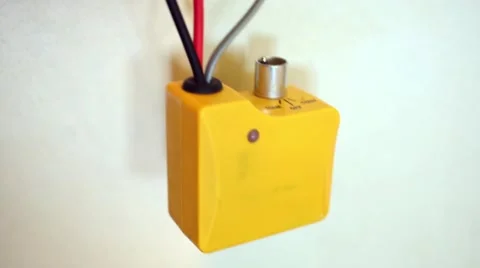 Tone generator connected with wires to line input hangs on wall Vídeos de archivo 51876258