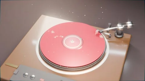 Tonearm lifting, turntable spinning red vinyl on tabletop with particles for Stock Footage 337885945