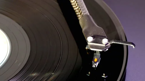 Tonearm on long playing record (LP), with vinyl movement. Stock Footage 66723179