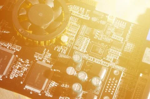 A toned macro image of a computer board with many small technological element Stock Photos