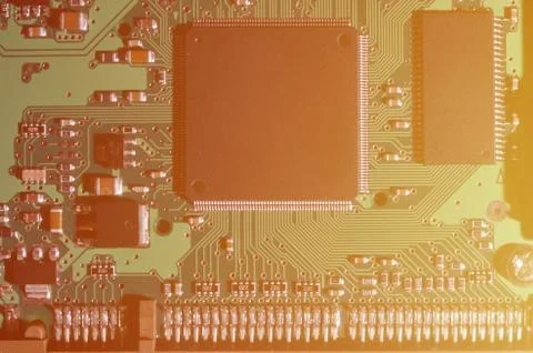 A toned macro image of a computer board with many small technological element Stock Photos