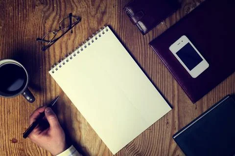 Toned table write hand top view toned table write hand top view ,model rel... Foto stock